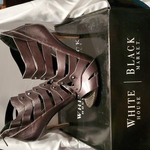 White House /Black Market heels. Platinum silver leather. Size 6 and 1/2.